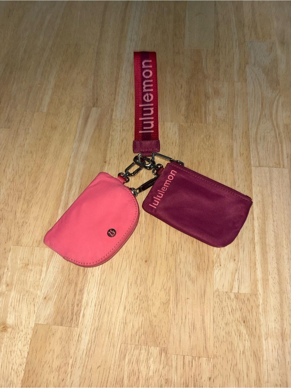 lululemon athletica dual pouch wristlet in pink and wine